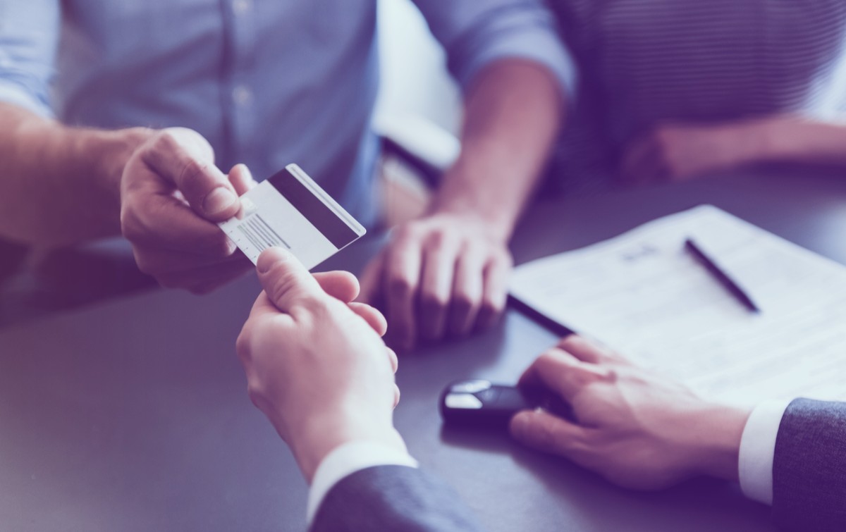 Client Give Credit Card to Auto Sales Consultant.