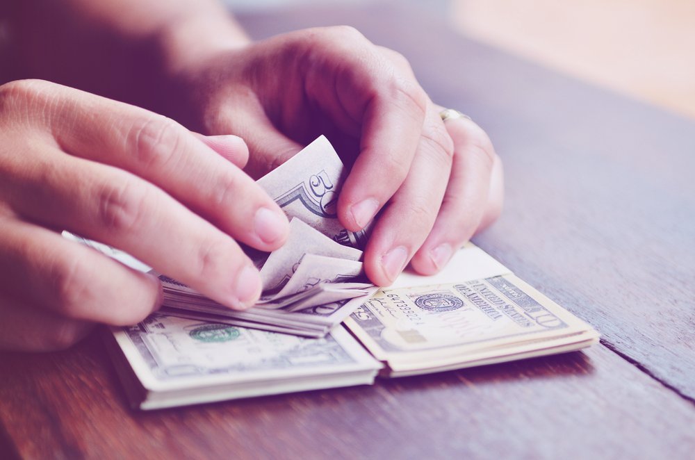 Man counting money.