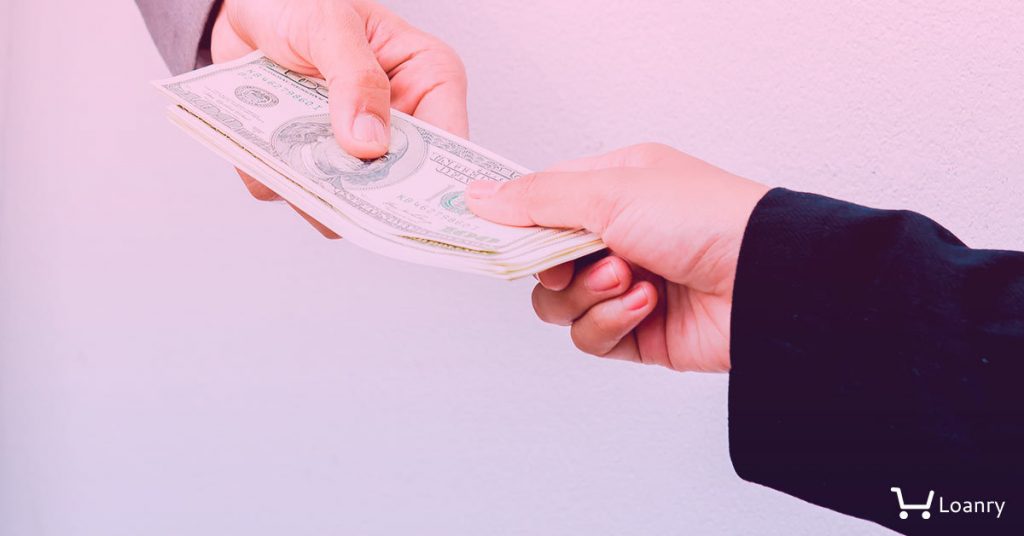Money from hand to you,Close-up of Person hand giving money To other hand