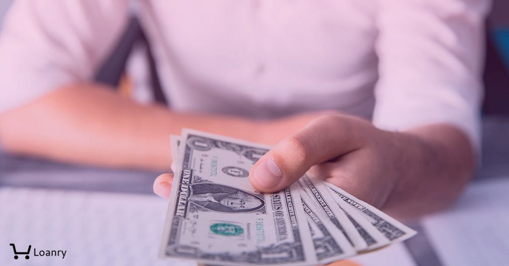 Man hand money with document on desk