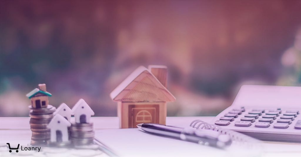 House placed on coins. notebook and pen Prepare planning savings money of coins.